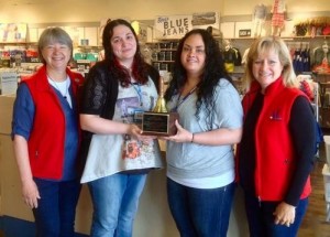 Left to right: Shelby Mogenson, past Chapter president; Susan Prettyman, past manager Osh Kosh B' Gosh Seaside Factory Outlet; Lena Bradwell, current manager; Liz Knutsen, Operation School Bell chair.