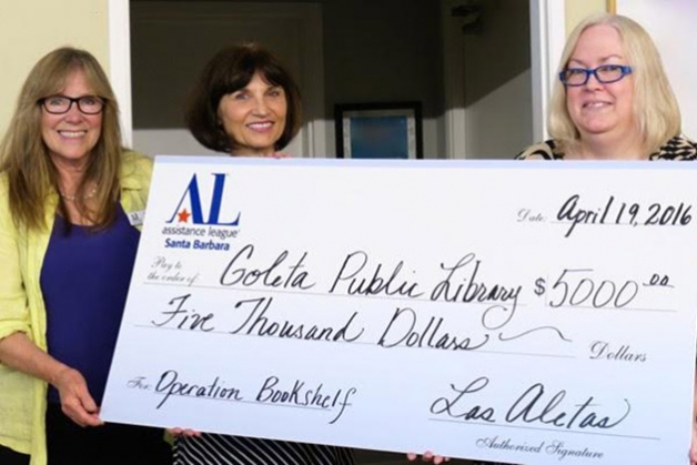 Allison Gray, at right, Supervising Librarian for the Goleta Library, accepts a check for $5,000 from Kathy Kelly, left, and Patti Beal, members of Las Aletas. The funds will be used to purchase large print books for the library. (Contributed photo)