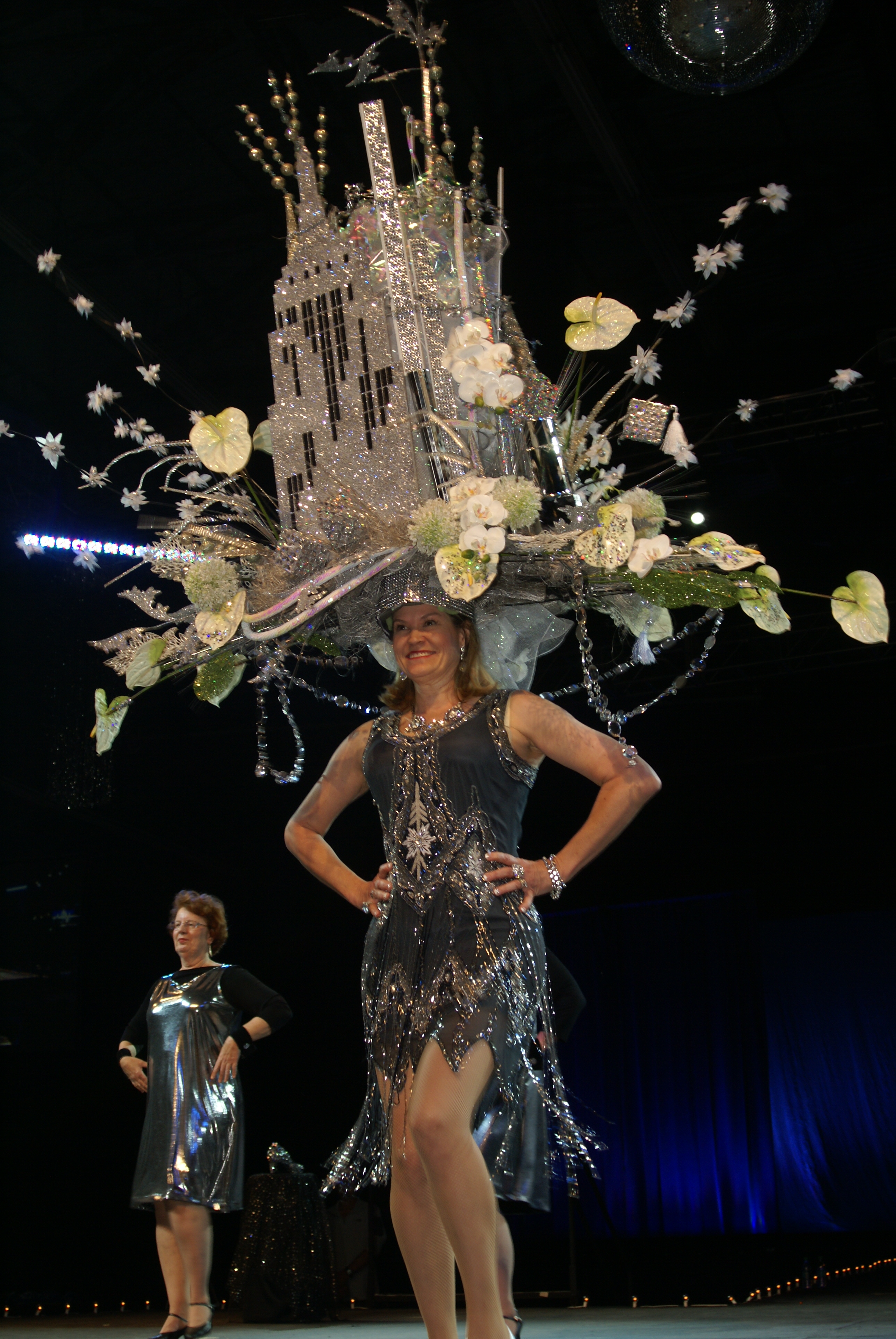 Assistance League member volunteer Margie Arnett performs “Uptown Girl” at Assistance League of San Bernardino’s 55th Annual Signature Headdress Ball “Ballroom Blitz” on Saturday, April 30.