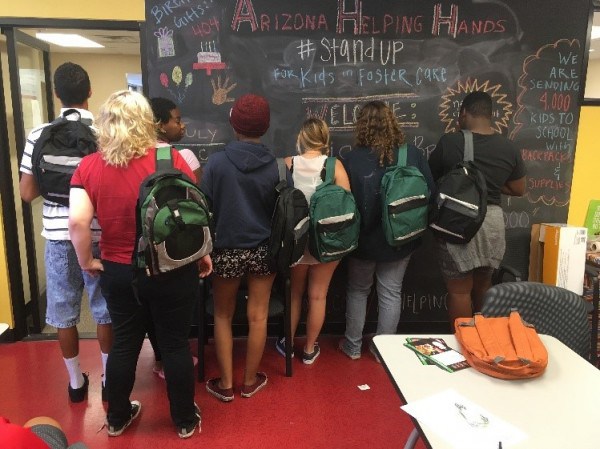 Students from all over the Valley attended the Arizona Helping Hands backpack distribution event Saturday, July 23.