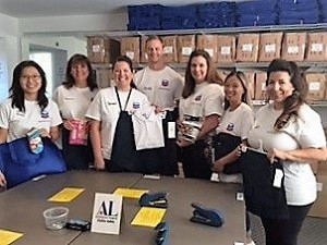 Seen above, (l to r) Chevron employee volunteers Julia Kang, Kathleen Deane, Brenna Johnson, Mike Balich, Nancy Smith, Irene Gough, and Chevron Corporate Caring Volunteers Week Coordinator Karen Moe gathered articles of clothing to fill 196 reusable bags that will soon be distributed to elementary schoolchildren in our community.