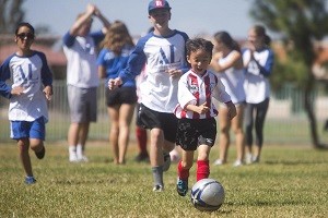 Six-year-old Jaden Panaguiton dribbles the ball during soccer practice in Tustin on Sunday, October 2, 2016. (Drew A. Kelley, Contributing Photographer)
