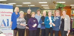 At the 30th anniversary celebration for the Assistance League of Kansas City, the 2016-2017 President Cindy McGinnis, left, thanks eight of the founding members: Karen Moreno, Judy Chastain, Carolyn White, Elaine Henderson, Judy Frame, Joy George, Sara Hoecker and Barbara Reynaud.