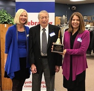 From left to right: Chapter President Cindy McGinnis just presented the Operation School Bell® Award to Ray Brock, Linscomb Foundation board member, and Gwen Wurst, Linscomb Foundation staff member.