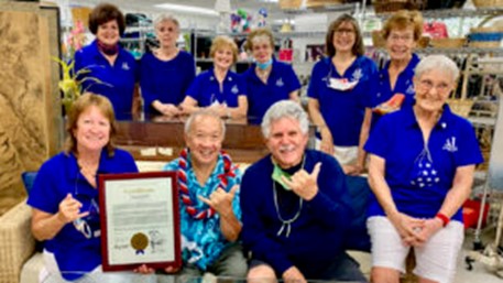 Councilman Calvin Say presented a proclamation to Assistance League of Hawaii on behalf of the City & County of Honolulu in recognition of our 50th anniversary year (above). Top banner photo: State Rep. Della Au Belatti presented Assistance League of Hawaii with a legislative certificate from the State House of Representative in observance of our 50th year milestone. She is shown with our president, Mary Monohon.