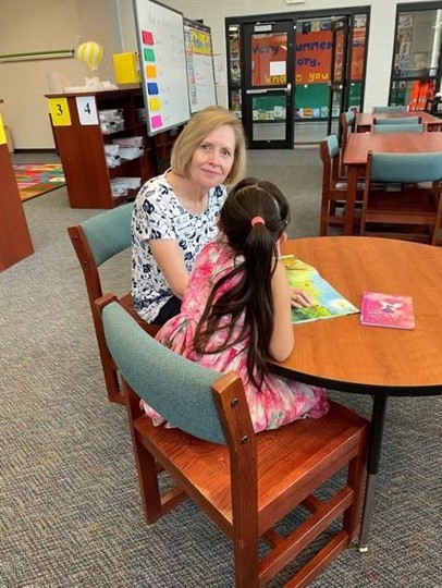 Molly Parkhill with her Reading Buddy